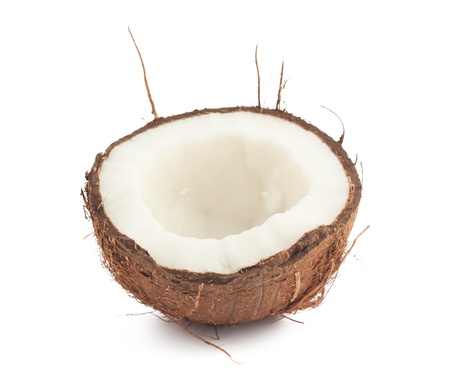One half of coconut isolated on white backgroundの写真素材