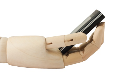 wooden hand holding a mobile phone on white backgroundの写真素材