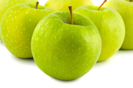 fresh green apples isolated on white backgroundの写真素材