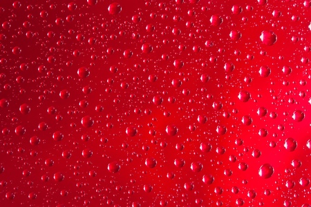 Abstract water drops on red backgroundの写真素材