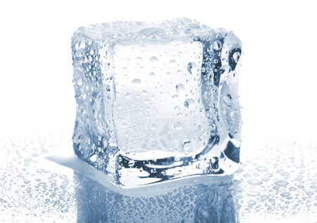 Single ice cube with water drops isolated on white backgroundの写真素材