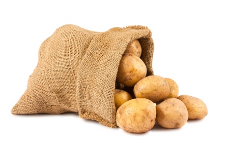 Raw potatoes in burlap sack isolated on white background Raw potatoes in burlap sack isolated on white background