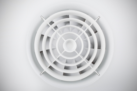 Round white plastic grille with air fanの写真素材