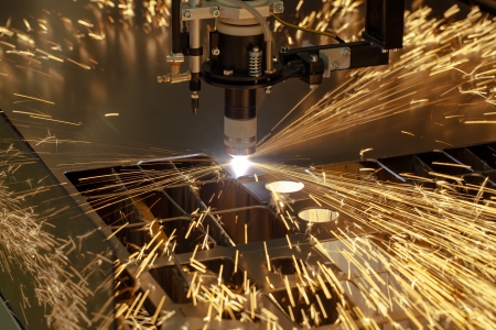 Plasma cutting metalwork industry machine with sparksの写真素材