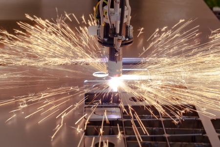 Plasma cutting process of metal material with sparksの写真素材