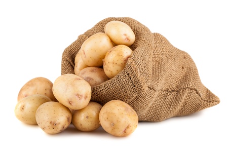 Ripe potato in burlap sack isolated on white background Ripe potato in burlap sack isolated on white background