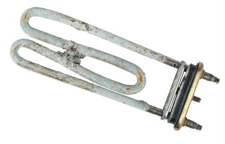 Broken heating element of water heater isolated on white backgroundの写真素材