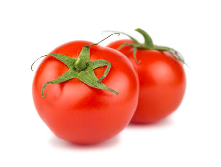 Pair of ripe red tomato isolated on white backgroundの写真素材