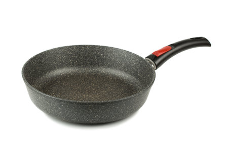 Black frying pan isolated on white backgroundの写真素材