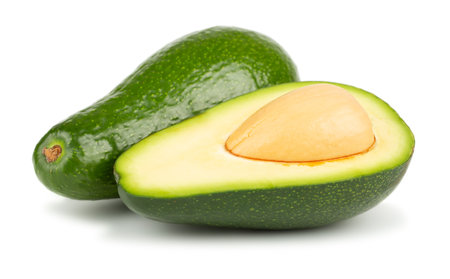 Half and whole avocados isolated on white backgroundの写真素材
