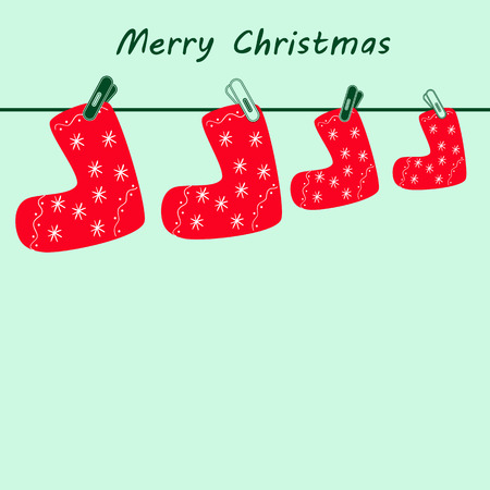 Four cartoonlike Christmas stockings decorated with stylized snowflakes, wavy lines and points hanging on clothesline for all familyのイラスト素材