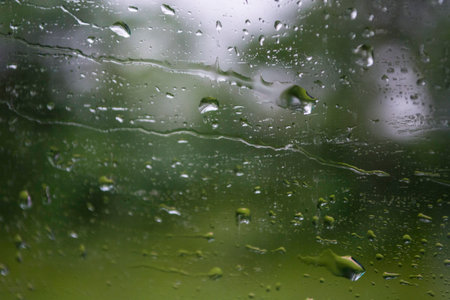 Water droplets on a windowの写真素材