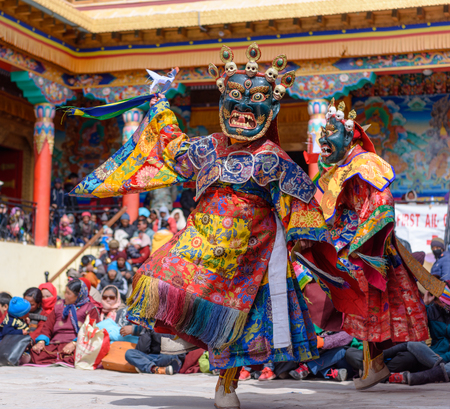 Buddhist Monk with dragon mask dancing at colorful buddhism mask dance festival of Matho in Ladahk,...