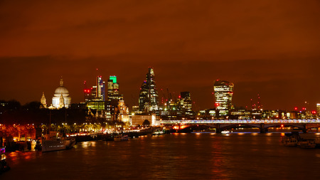 London night skyline with St Pauls Cathedral and the financial district. Thames river in front.の写真素材