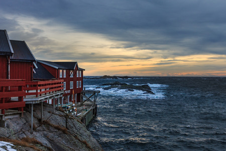 Traditional red house in typical landscape on lofoten islands in northern norwayのeditorial素材