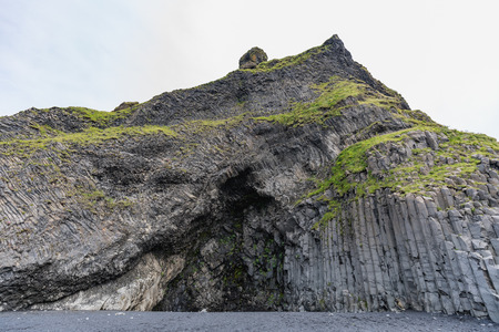 strange stone structures on the black beach reynisfjara in iceland