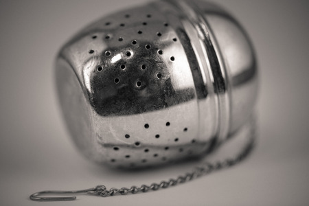 monocrome macro shot of a metal tea strainer, kitchenの写真素材