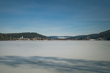 Winter landscape on the frozen Titisee in the Black Forest, germanyの写真素材