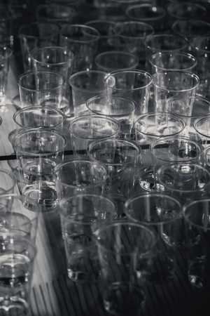 macro shot of plastic cups for degustation standing on a table, switzerland