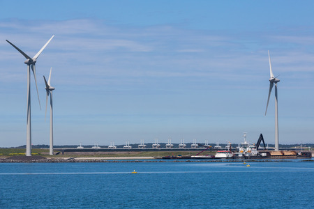 Neeltje Jans, The Netherlands - jun 8, 2014 - Dredging ships work to keep the schelde river clear...
