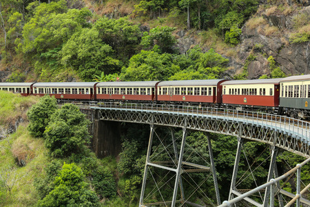 KURANDA, AUSTRALIA - September 02, 2016: Kuranda Scenic Railway crossing an elevated bridge over Barron Gorge National Park near Cairns, Australiaのeditorial素材