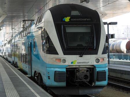 SALZBURG, AUSTRIA - March 03, 2018: Electric westbahn double decker train at the Salzburg main...