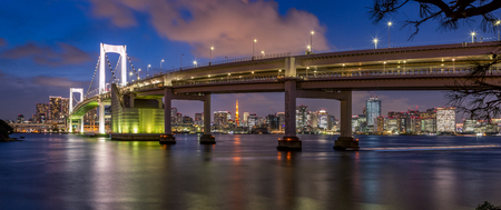 Tokyo Rainbow bridge and Tokyo Tower at sunset with scenic night illuminationのeditorial素材