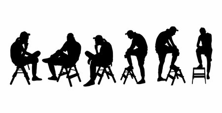 vector set of silhouettes of men sitting and relaxingのイラスト素材
