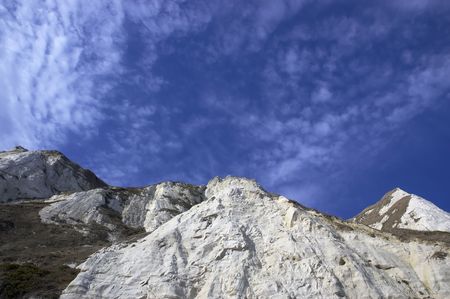 White cliffs with a cloudy blue skyの写真素材