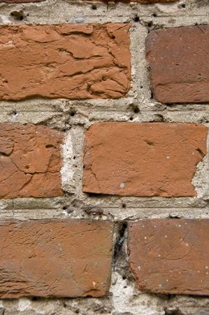 An old weathered brick wall background