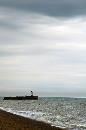 A view of a pebbley beach from a low angleの写真素材