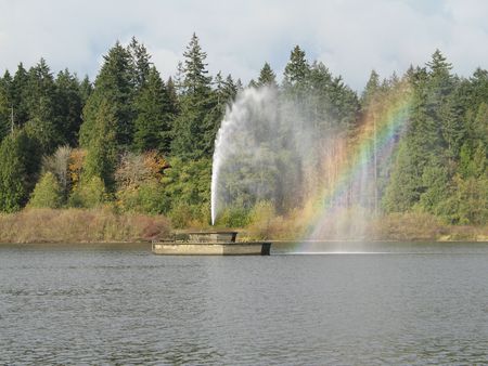 fountain in a lakeの写真素材