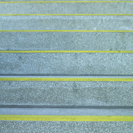 Concrete steps with yellow linesの写真素材