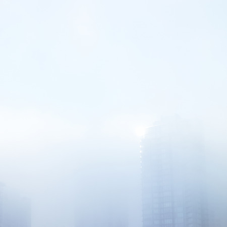 Tall tower hidden in a thick fogの写真素材