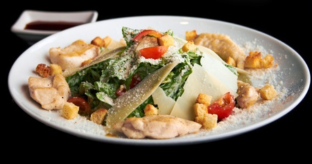Caesar salad on white plateの写真素材