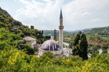 View to the Mosque in small town Pocitelj, Bosnia and Herzegovinaの写真素材