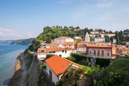 Panoramic view of houses and old city walls of Piran, Sloveniaの写真素材
