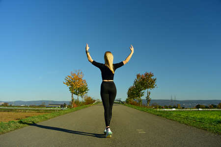 Blind girl in pose for yoga exercises.の写真素材