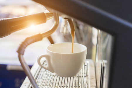 Coffee maker with coffee cup.の写真素材