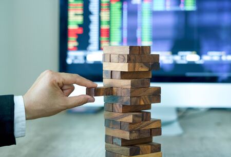 Businessman Building Up Tower, Challenge In Business Conceptの写真素材