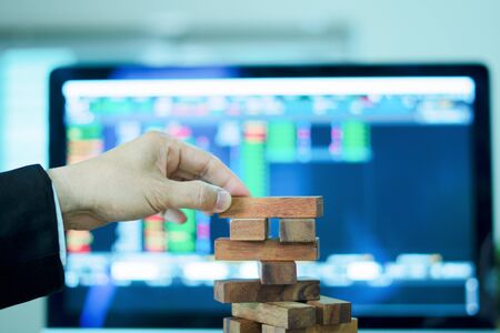 Businessman Building Up Tower, Challenge In Business Conceptの写真素材