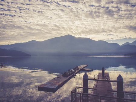 Vintage style: Sun moon lake with mountain and reflection of mountain, Taiwanの写真素材