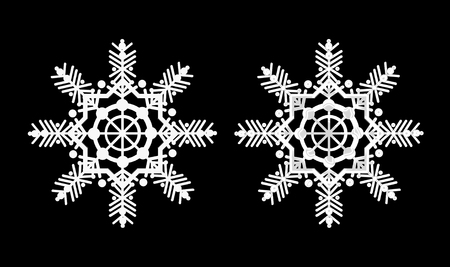 White snowflakes on a black background, matte and frostyの写真素材