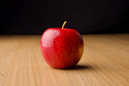 An isolated red apple