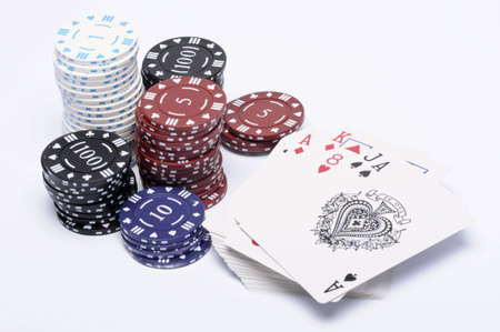 Stacks of gambling chips and play cardsのeditorial素材