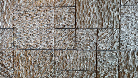 Decorative brick wall background. Wall made of natural stone blocks.