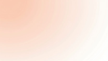 A gentle gradient of peach and white creates a soft, inviting background. The subtle shift in color evokes warmth and tranquility.の素材