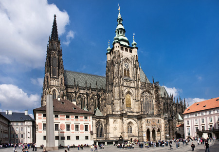 The Cathedral of Saints Vitus, Wenceslaus and Adalbert is an excellent example of Gothic architecture and is the biggest and most important church in the country. Located within Prague Castle and containing the tombs of many Bohemian kings and Holy Roman のeditorial素材