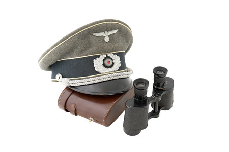 Composition with German officer service cap and popular field glass. ONLY FOR HISTORICAL PURPOSES !!!のeditorial素材