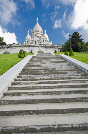 Sacre Coeur is a Roman Catholic church and minor basilica, dedicated to the Sacred Heart of Jesus, in Paris, France. A popular landmark on Montmartre, the highest point in the city.の写真素材